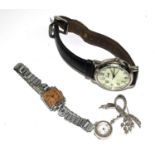 A ladies silver pendant watch, by Tenexact, with floral spray clip and a ladies 1940s Landi