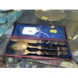 A cased set of Victorian silver gilt knife, fork and spoon with banded agate handles (damage to