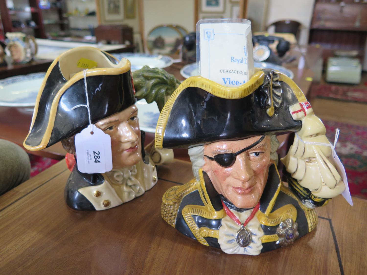 A Royal Doulton character jug of Vice-Admiral Lord Nelson (D6932), with certificate; and another