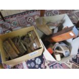 A collection of wood and moulding planes, most stamped with various names.