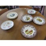 A pair of Edwardian shell shape plates with printed floral sprays, Spode Woodland pattern dinner