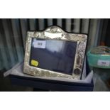 A silver children's photo frame with teddy bear and toys decoration 8cm x 12.5 cm in original box,