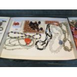 A selection of semi precious stone and silver necklaces including jasper, rock crystal, lava,