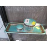 A dressing table set consisting of a silver and turquoise enamel tray and two glass jars with silver