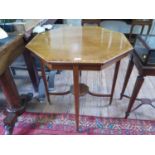 An Edwardian crossbanded mahogany window table, the octagonal top with chequer banding on square