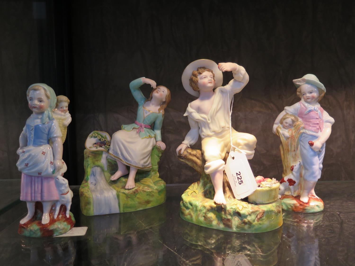 Two painted Parian figures of a young boy and a girl together with two hard paste figures of a young - Image 2 of 2