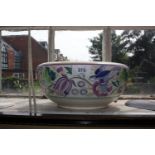 A Poole Pottery traditional swallow floral bowl, hand decorated 24 cm diameter, circa 1952-55