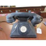 A black No.162 CB. G.P.O. C34/234 telephone with fabric covered cord (no dial)