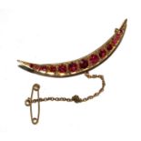 A ruby and diamond crescent brooch, no hallmark