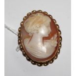 A shell cameo, set in 9 carat gold, depicting a young lady