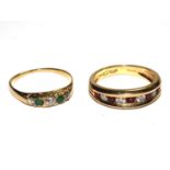 An 18 carat gold ring set with rubies and diamonds, together with a gold coloured metal emerald