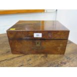 A Victorian walnut sewing box, with inlaid brass shield cartouches, the fitted interior with tray,