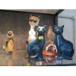 A pair of Poole Pottery cat figures, 16 cm high, another figure of a cat, a Goebels figure of a