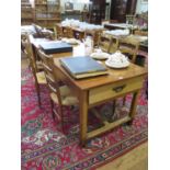 A 19th century French cherrywood dining table, the rectangular top with frieze drawer at either