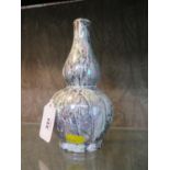 A Tuscan china gourd shaped Ploverine lustre finish vase circa 1930