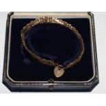 A 9 carat gold bracelet with padlock clasp in original case