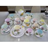 Roslyn China Wheatcroft Roses pattern tea and coffee service, including coffee pot, bread plate, and