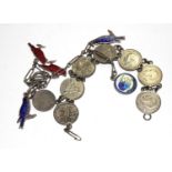 A Sterling silver charm bracelet with enamelled charms together with a coin bracelet