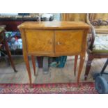 A 19th century French inlaid kingwood side table, the shaped top inlaid with a basket of flowers