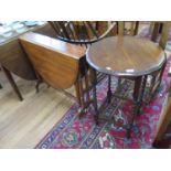 A Victorian mahogany Sutherland table, the oval top on turned supports, 84 cm wide, and an oak