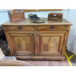 A 19th century French cherrywood buffet or sideboard, with two frieze drawers over a pair of