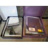 A Carrs silver plated photo frame 5" by 3 1/2" aperture in original box together with a silver