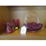 A Murano ruby red and gold aventurine glass basket dish, together with a small cranberry glass jug