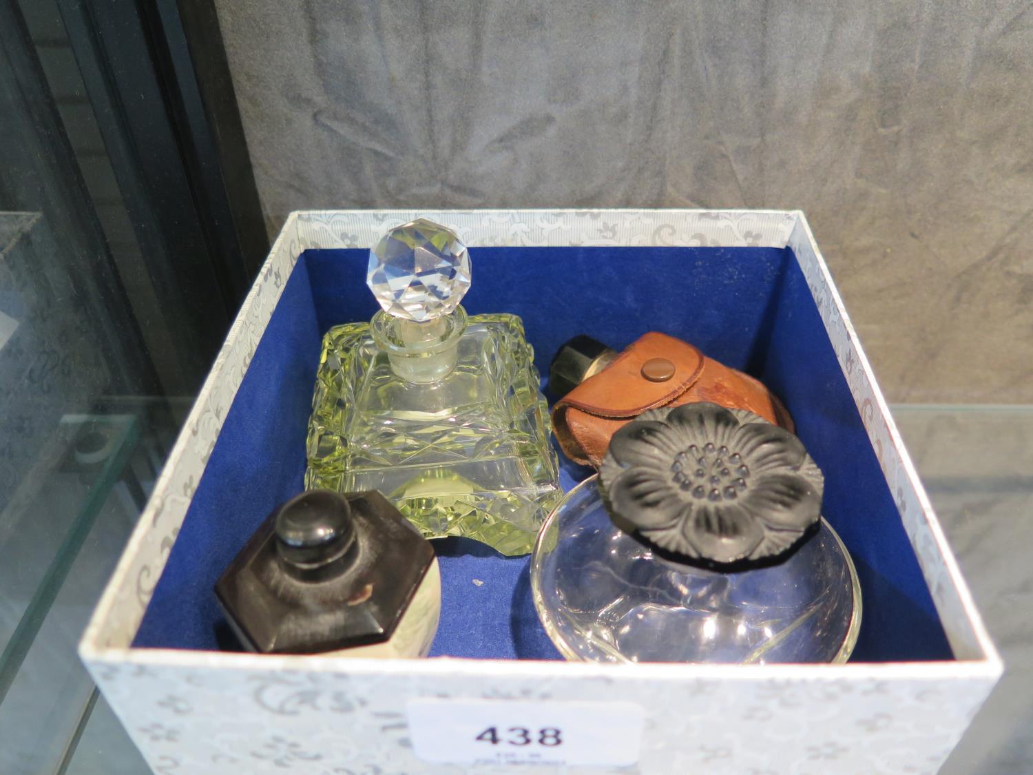 A Chinese scent/snuff bottle with erotica decoration, together with three glass scent/ smelling salt