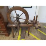 A 19th century spinning wheel, 86 cm wide