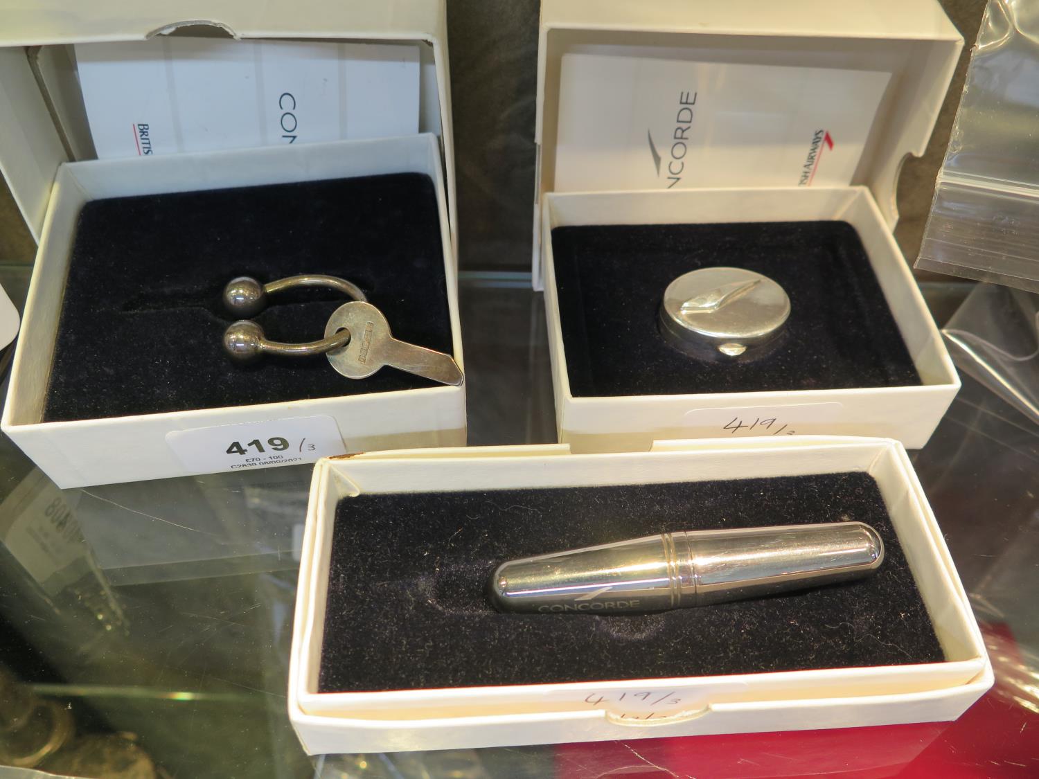 A silver Links of London Concorde pill box and key ring, and a silver plated Concorde corkscrew, all