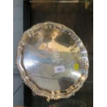 A silver salver, with gardooned pir-crust edge, the centre engraved with a Rolls Royce logo, a