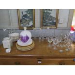 Various sets of drinking glasses, a globular table lamp, a coffee canister and various plates