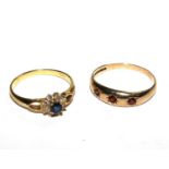 An 18 carat gold ring set with a sapphire and diamond cluster, together with a 9 carat gold ring set