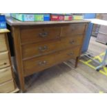 An Edwardian mahogany and satinwood crossbanded bedroom chest, with two short and two long drawers