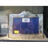 A silver children's photo frame with teddy bear and toys decoration 8cm x 12.5 cm in original box,