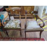 A Regency mahogany carver chair, the tablet top rail and rope-twist rail over a drop in seat and