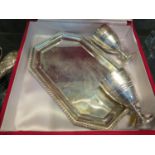 A tray marked "silver" and two unmarked white metal goblets, cased