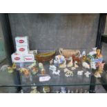 A collection of Wade Whimsies including dinosaurs, viking longboat, giraffes and other animals,