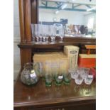 A Whitefriars green glass water jug and six glasses, in original box, six Whitefriars cut glass