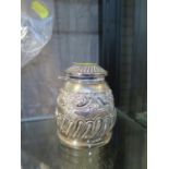 A silver highly decorated ink well, with gadrooned and floral decoration, 8 cm high, as found