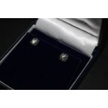 A pair of 18ct white gold four claw good quality round brilliant cut diamond studs. Diamond 2.02ct.