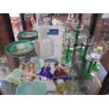 A set of six green stemmed wine glasses, a square decanter, four Victorian style pictorial plates,