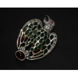 A Silver Eagle brooch/pendant set with a cabochon garnet, ruby eye, marcasite and plique-a-jour