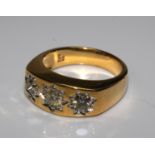 9ct yellow gold three stone diamond ring. Centre 0.40ct. Outer x2 0.69ct total. Size Q and a half