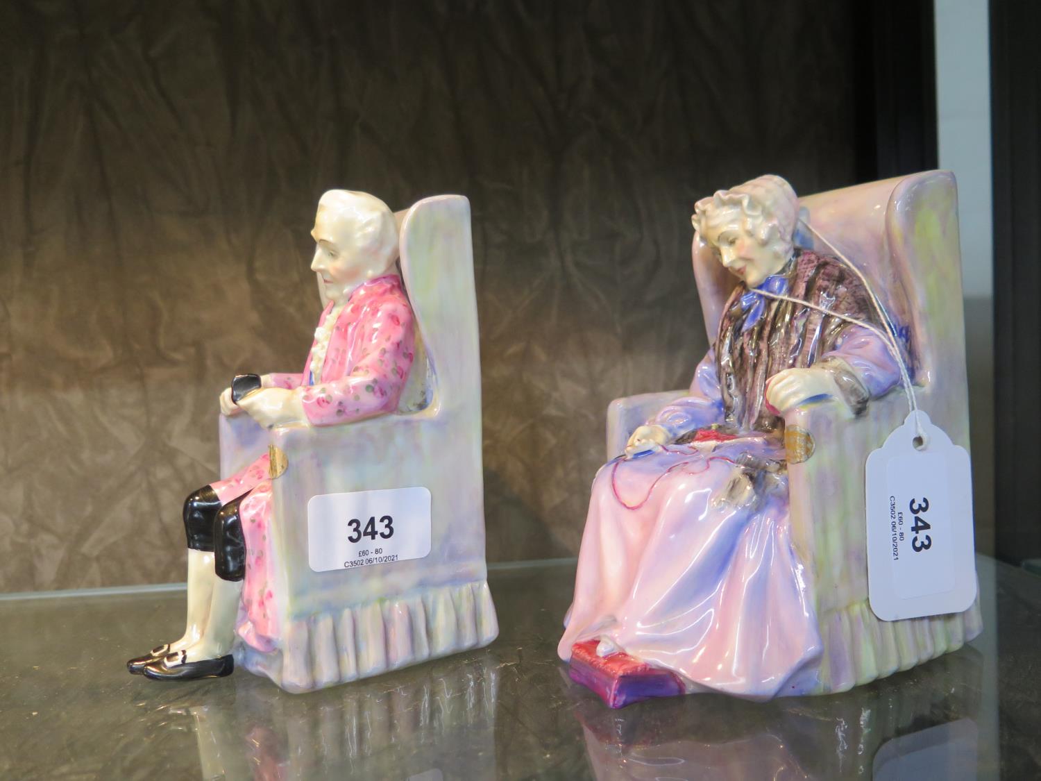 A pair of Royal Doulton figures: Joan HN 1422 and Darby HN 1427 (seat cracked to Joan), 14 cm