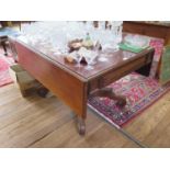 A William IV mahogany Pembroke table, with cushion moulded frieze and drawer on a square waisted