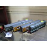 Two Hornby yellow TW55611 Regional Railway diesel DMU locomotives, one Triang British Rail green