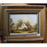 T.K. Douglas Woodsmen by a white cottage oil on canvas signed 24 x 34 cm