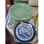 A Chinese Celadon dish, with central chrysanthemum flower, seal mark to base, 29 cm diameter, a blue