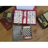 An H.P. Gibson & Sons Mah Jong Set, a Jaques travelling chess set, a set of Bridge cards retailed by